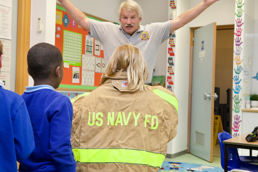 Stop, Drop, and Educate: NSA Naples Firefighter presents at Local International School