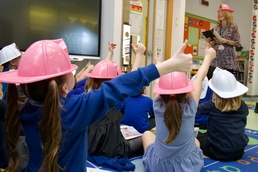 Stop, Drop, and Educate: NSA Naples Firefighter presents at Local International School