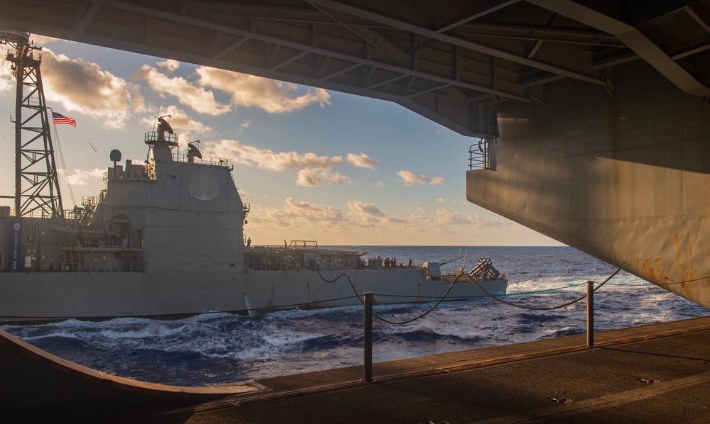 USS Ronald Reagan (CVN 76) conducts fueling-at-sea with USS Chancellorsville