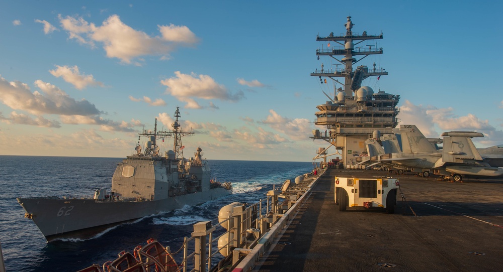 USS Ronald Reagan (CVN 76) conducts fueling-at-sea with USS Chancellorsville