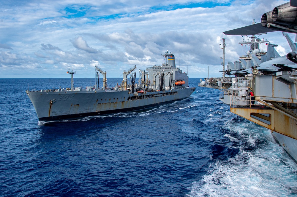 USS Ronald Reagan (CVN 76) conducts fueling-at-sea with USNS Rappahannock (T-AO 204)