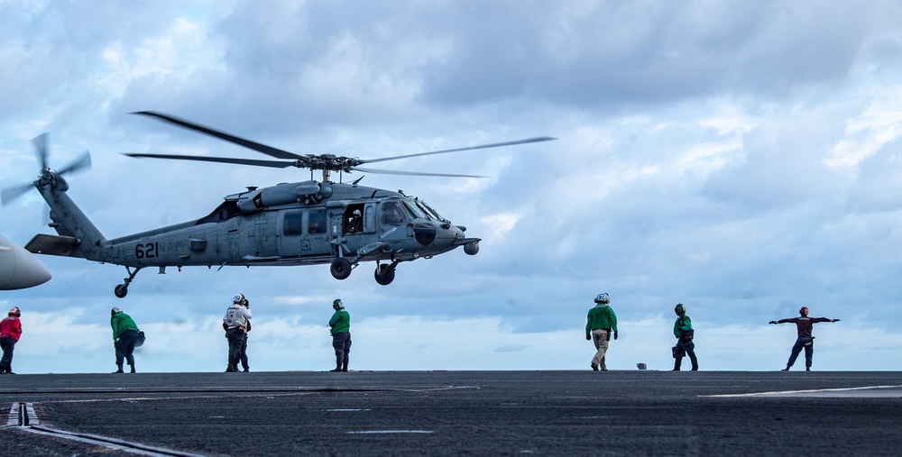 USS Ronald Reagan (CVN 76) conducts fueling-at-sea with USNS Rappahannock (T-AO 204)