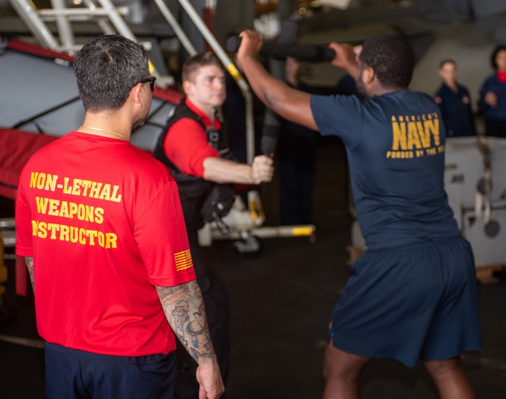 USS Ronald Reagan (CVN 76) Sailors conduct security training