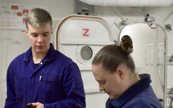 USCGC Hamilton personnel conduct small arms and minor mount performance qualification system training while operating in the Baltic Sea