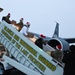 Alaska Air and Army National Guardmen serve as elves and deliver Holiday packages to Minto