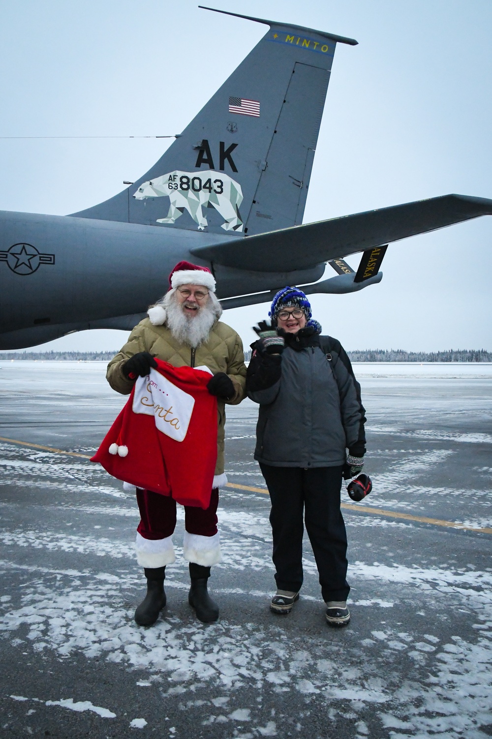 Alaska Air and Army National Guardsmen serve as elves and deliver Holiday packages to Minto