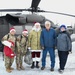 Alaska Air and Army National Guardsmen serve as elves and deliver Holiday packages to Minto