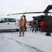 Alaska Air and Army National Guardsmen serve as elves and deliver Holiday packages to Minto