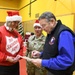 Alaska Air and Army National Guardsmen serve as elves and deliver Holiday packages to Minto