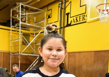 Alaska Air and Army National Guardsmen serve as elves and deliver Holiday packages to Minto