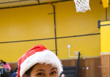 Alaska Air and Army National Guardsmen serve as elves and deliver Holiday packages to Minto