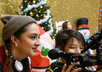 Alaska Air and Army National Guardsmen serve as elves and deliver Holiday packages to Minto