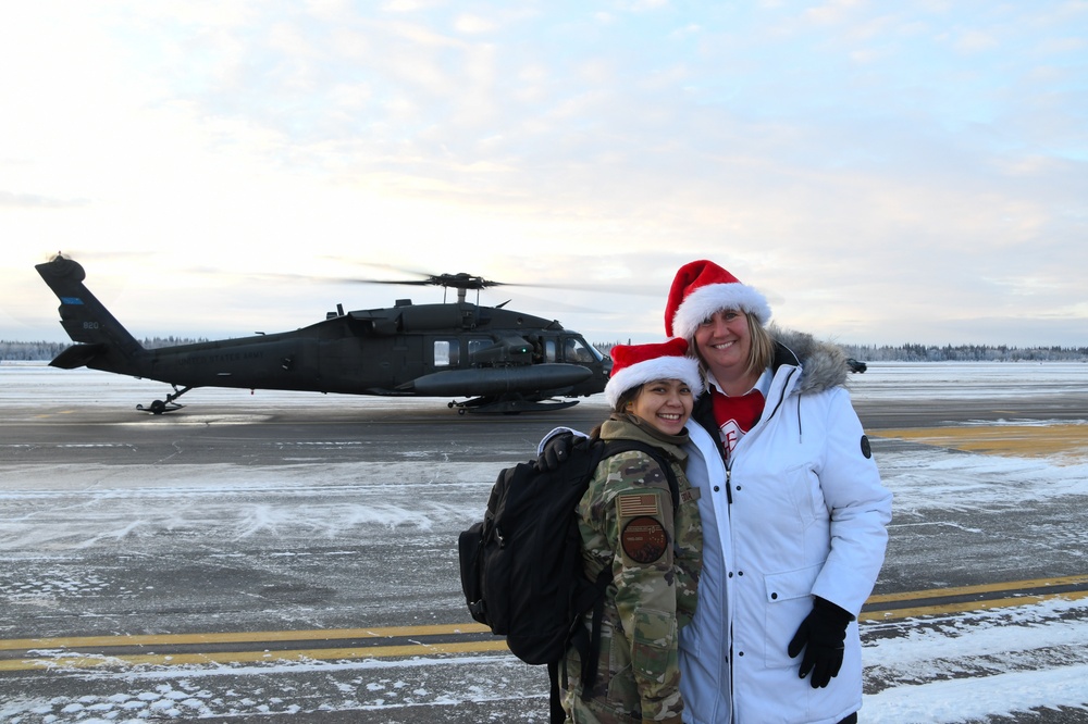 Alaska Air and Army National Guardsmen serve as elves and deliver Holiday packages to Minto