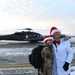 Alaska Air and Army National Guardsmen serve as elves and deliver Holiday packages to Minto