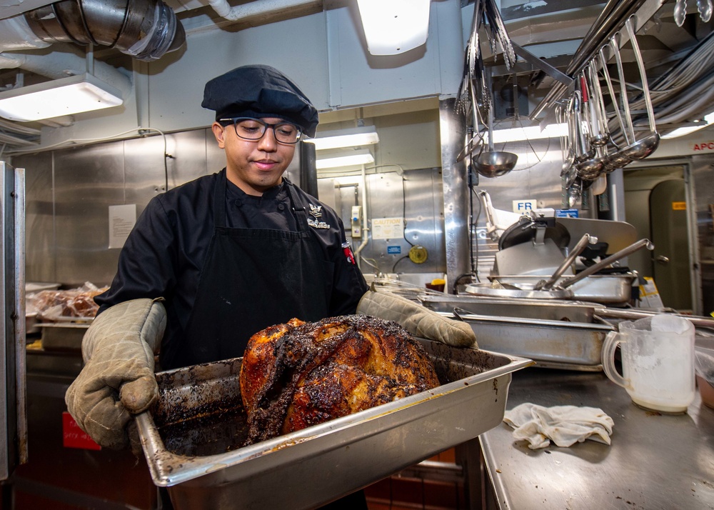 USS Ronald Reagan (CVN 76) Sailors prepare Thanksgiving feast