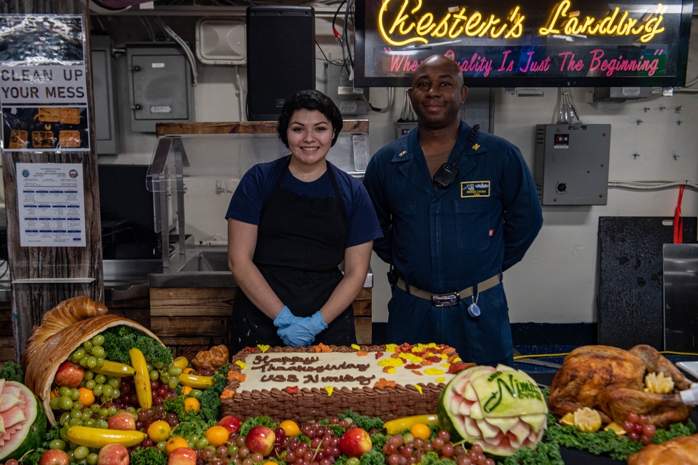 Sailors Pose In Front Of Thanksgiving Cake