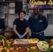 Sailors Pose In Front Of Thanksgiving Cake