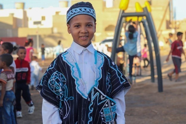 Children enjoy the new playground in Sedamous, Libya.