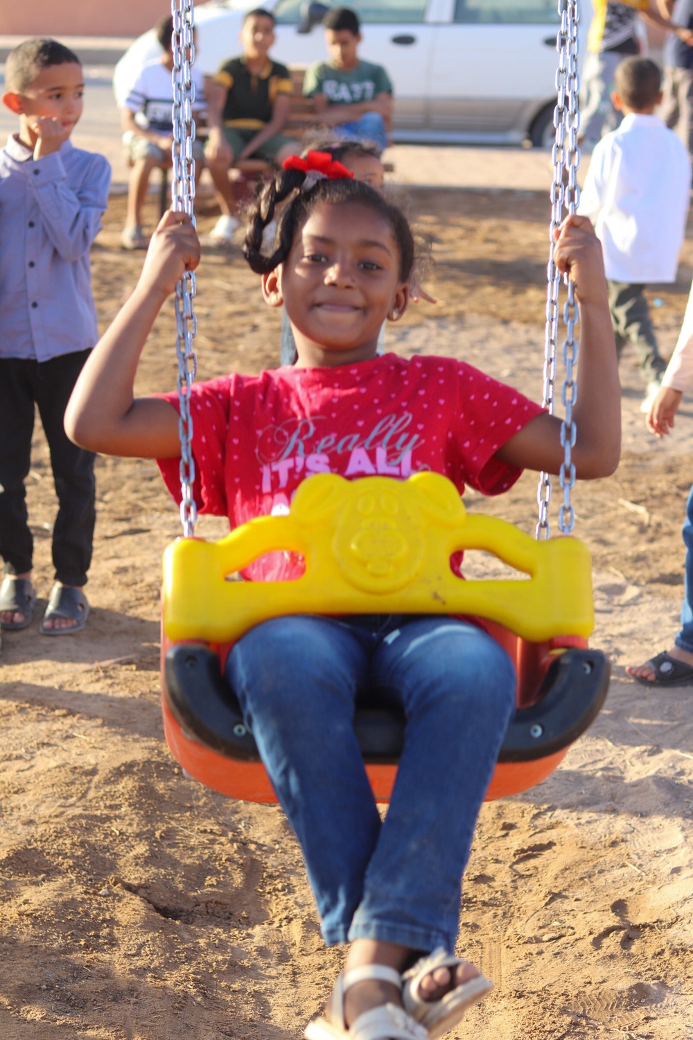 Children enjoy the new playground in Sedamous, Libya.