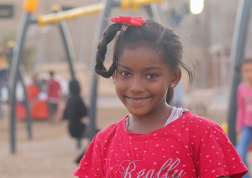 Children enjoy the new playground in Sedamous, Libya