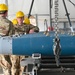 113th AMXS train by building GBU-38s