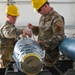 113th AMXS train by building GBU-38s