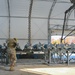 113th AMXS train by building GBU-38s