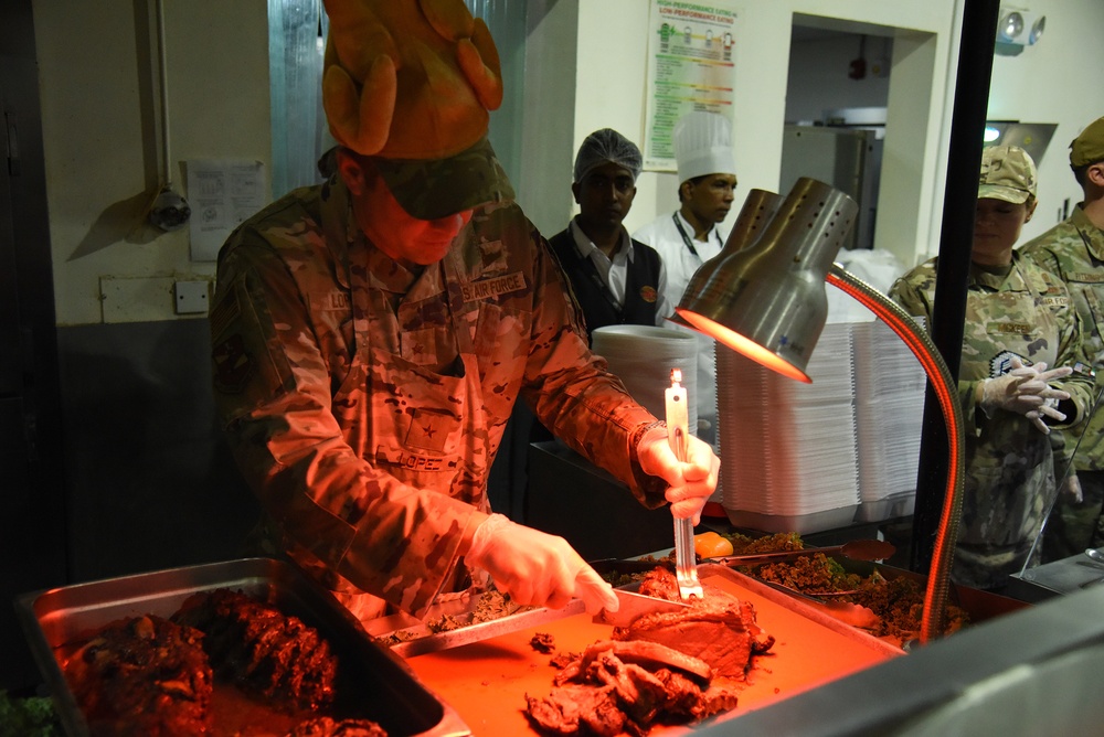 380th Air Expeditionary Wing Leadership Serve Thanksgiving