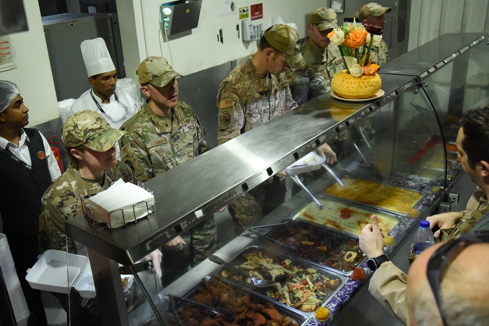 380th Air Expeditionary Wing Leadership Serve Thanksgiving