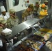 380th Air Expeditionary Wing Leadership Serve Thanksgiving