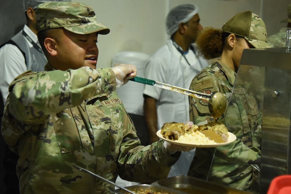 380th Air Expeditionary Wing Leadership Serve Thanksgiving