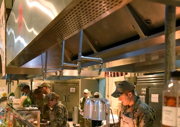 380th Air Expeditionary Wing Leadership Serve Thanksgiving