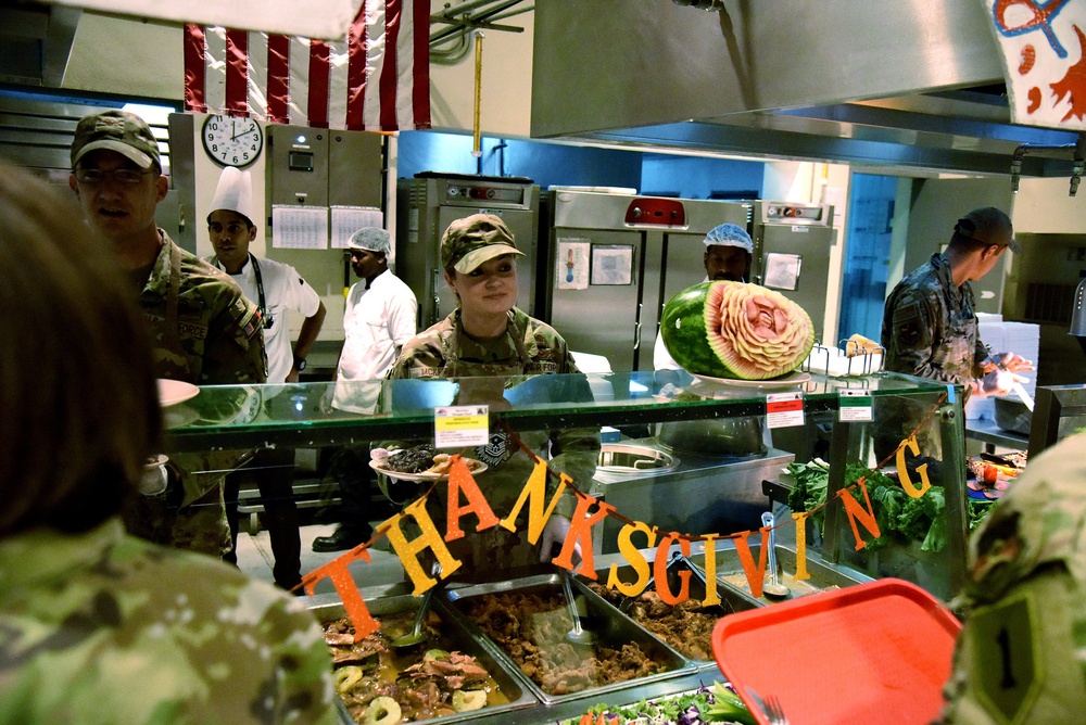 380th Air Expeditionary Wing Leadership Serve Thanksgiving