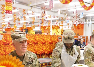 ARCENT's Lt. Gen. Patrick D. Frank and Command Sgt. Maj. Jacinto Garza serve Thanksgiving meals, Kuwait, November 2022