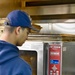 USCGC Hamilton personnel prepare a Thanksgiving feast for the crew while operating in the Baltic Sea