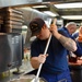 USCGC Hamilton personnel prepare a Thanksgiving feast for the crew while operating in the Baltic Sea