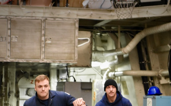 USCGC Hamilton personnel prepare a Thanksgiving feast for the crew while operating in the Baltic Sea