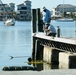 Crews Work to Check Safety of Pilings on Docks Damaged by Hurricane Ian