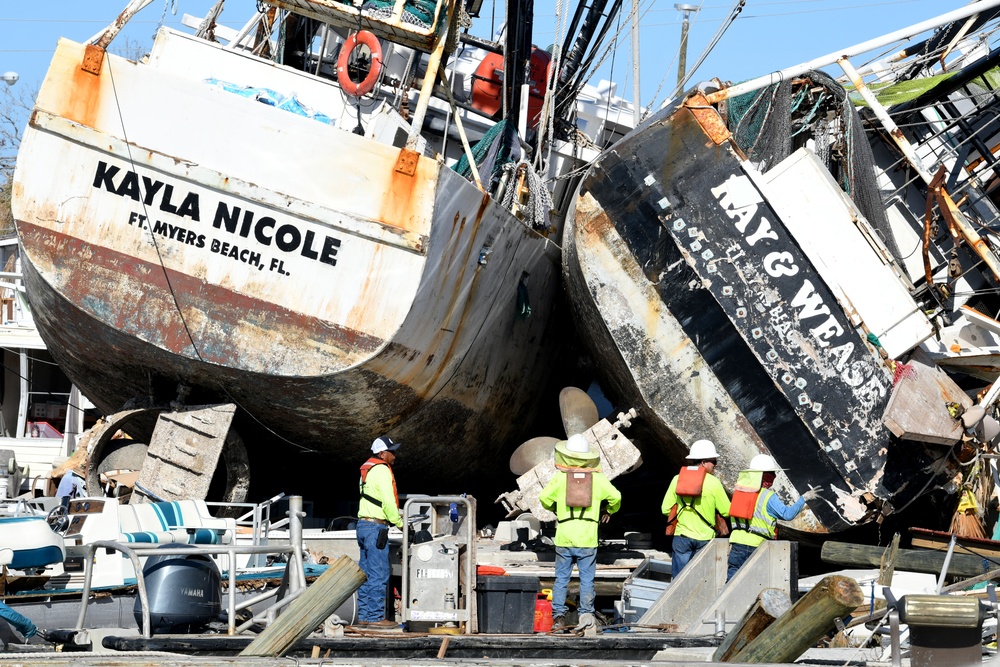 Crews Work to Access Boats That Have Been Damaged by Hurricane Ian