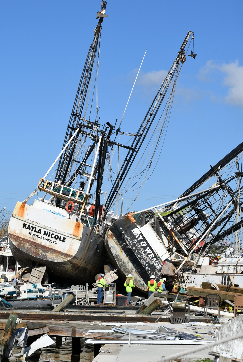 Crews Work to Access Boats That Have Been Damaged by Hurricane Ian