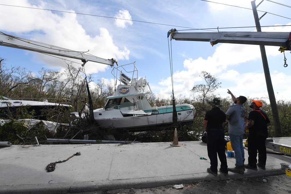 Crews Work to Move Displaced Boats