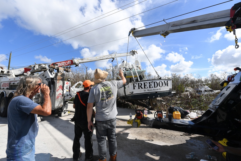 Crews Work to Move Displaced Boats