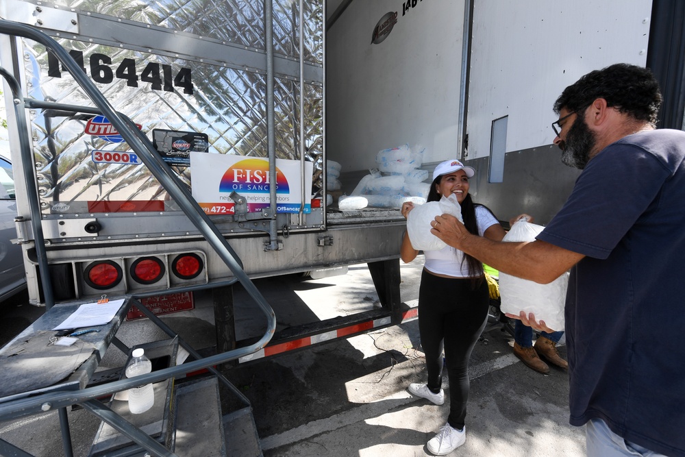 Volunteers Hand Out Ice On Sanibel Island