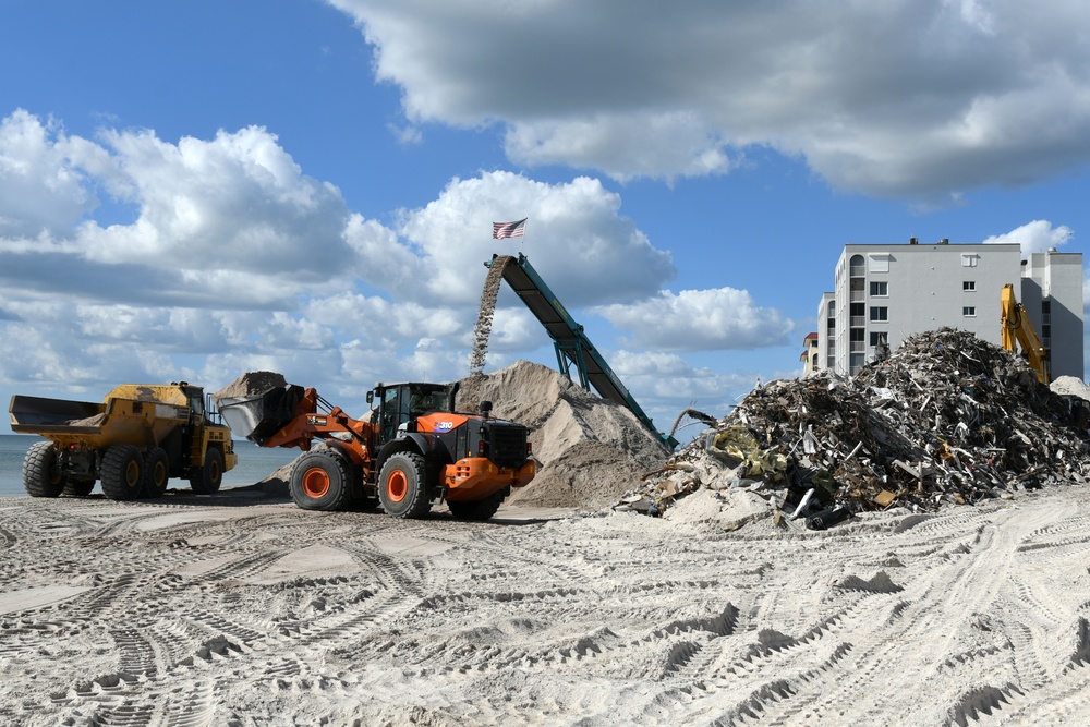 Crews Work To Cleanup The Beach Following Hurricane Ian