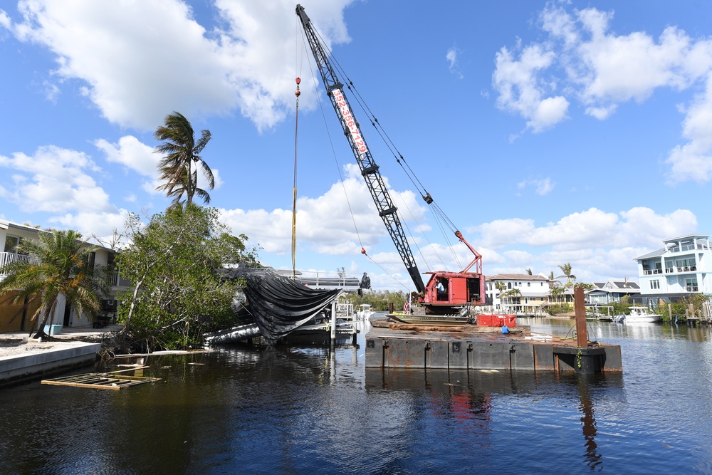 Crews Work to Move Displaced Boats