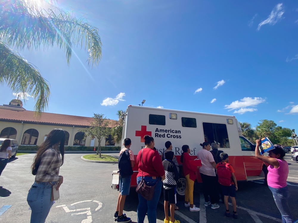 Red Cross Workers Distribute Meals at Jesus the  Worker Catholic Church After Mass