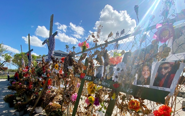 A Memorial Wall For Lost Loved Ones Stands in Centennial Park