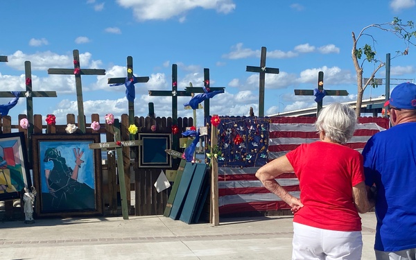 A Memorial Wall For Lost Loved Ones Stands in Centennial Park