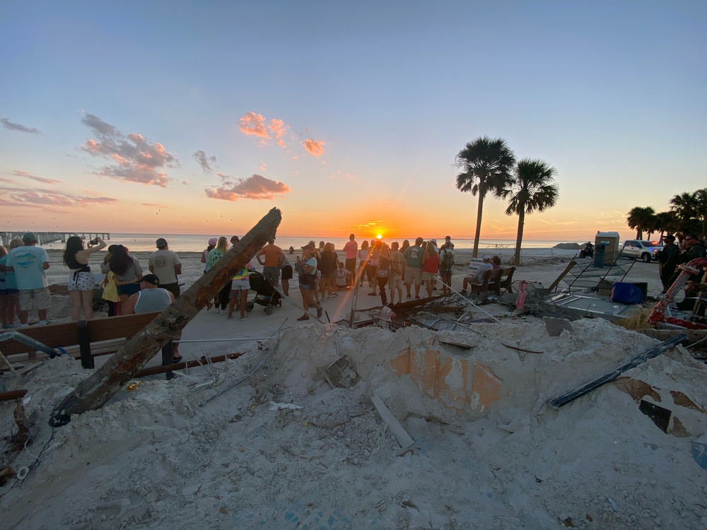 People Gather For a Vigil to Honor Hurricane Victims and Survivors