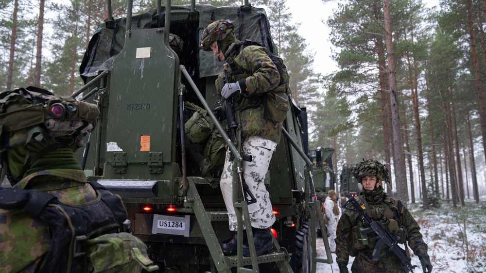 U.S. Marines with Combat Logistics Battalion 6 Transport Finnish Soldiers During Exercise Freezing Winds 22